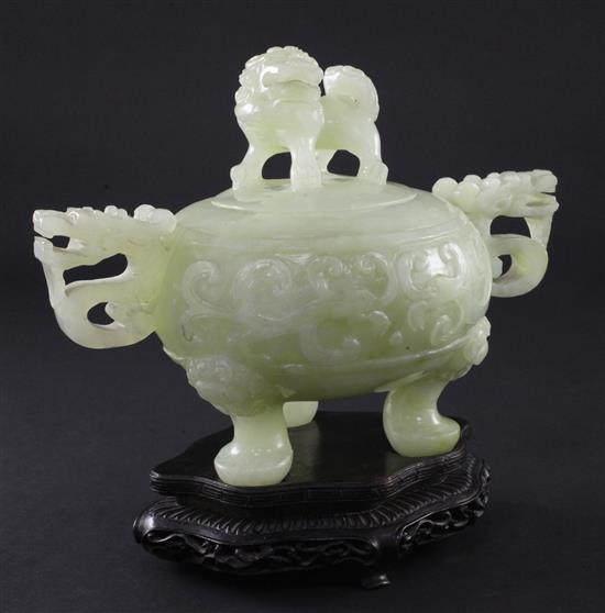 A Chinese pale green bowenite jade archaistic vessel and cover, 20th century, width 20cm, wood stand